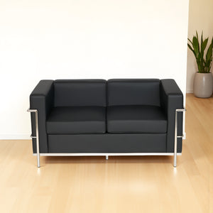 Black Faux Leather 3 Seater Sofa with Indoor Plant in Living Room Setting