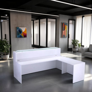 High Gloss White Return Reception Desk with Indoor Plant and Sofa in Reception Setting