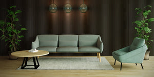 Koala Acoustic Wood Slats in Walnut Finish with Green Sofa and Armchair and Round Coffee Table in Lounge Setting