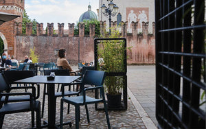 Nardi Thrill Stackable Monobloc Chair with Armrest in Anthracite with Square Table in Outdoor Settings