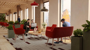 Quick Square Reception Table in Oak Top with Red Armchair and Sofa in Reception Setting