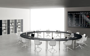 Round Shaped Meeting Room Table with Wide Centre Space with Tub Chairs and Bookshelves in Meeting Room Setting