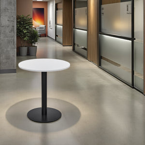 Round White Top Poseur Table in Breakout Area