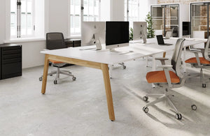 Switch Design 2 Person Bench Desk with Mesh Back Armchair and Closed Metting Pod in Modern Office Setting