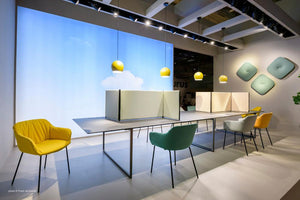 Toa Conference Table with Tub Chairs and Desk Screens in Boardroom Setting