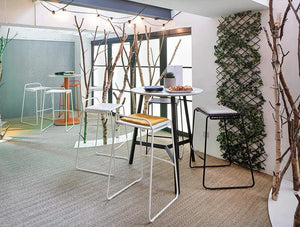 Veck Tubular Framed High Stool In Reception Area With Round Table And Seat Pad Orange Yellow White And Black Finishes