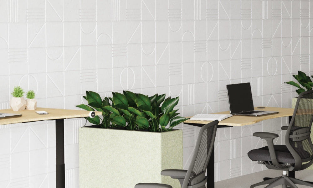 Acoustic Wall Panel in White with Sit Stand Desks and Grey Mesh Back Chair