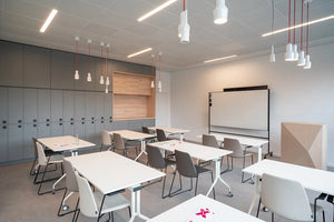 Argo Fixed Rectangular Table in with Pendant Light and Grey Locker in Classroom Setting