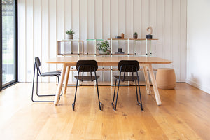 Blume Meeting Table with Black Finish Chair and Bookshelves in Meeting Room Setting