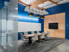 BuzziGrid Sound Absorbing Panel with Rectangular Table and Swivel Chair in Meeting Area