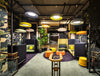 Buzziskin Printed Wallpaper 8 In Camo Amazon Print With Pouf And Coffee Table In Cafe Setting