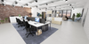 C-Sense Bench Desking with Black Office Armchair in Office Settings