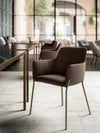 City Deco Armchair With 4 Deco Legs In Brown With Metal Table In Reception Area
