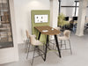 Confer Media Wall with Alega High Media Table in Oak Finish with Stark High Stool and Contour Ergonomic Chair and Key Bench Desk and Light Desk Screen in Modern Office Setting