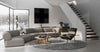 Daaz Modular Seating in Different Configurations with Round Coffee Table and Black Leather Armchair in Living Area Setting