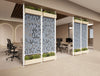 Decora Modular End of Desk Double Acoustic Panel with Planters in Blue Finish Together with Key Meeting Table and Jersey Task Chair in Modern Office Setting