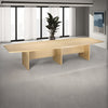 Elite Barrel Shaped Boardroom Table with 3 Panel Legs and Indoor Plant in Modern Office Setting 2