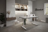 FlipMe Convertible Standing Desk with Banffy Stool and Wooden Shelving in Home Office Setting