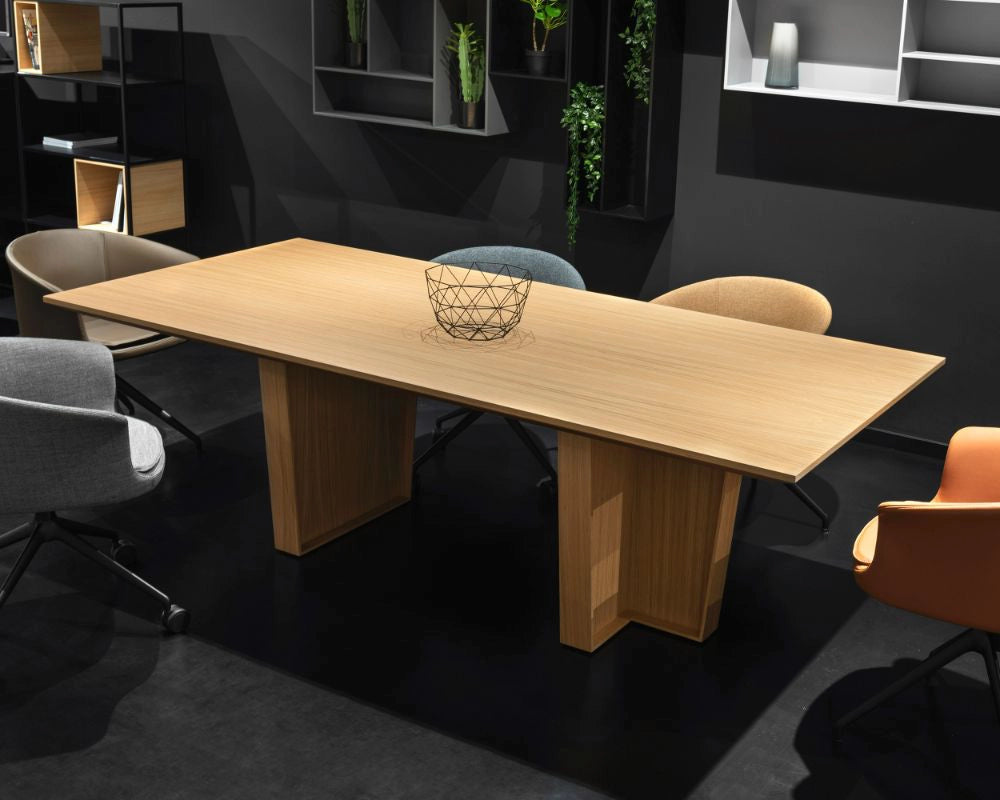 Gravos Conference Table in Oak Finish with Tub Chairs in Modern Meeting Room Setting