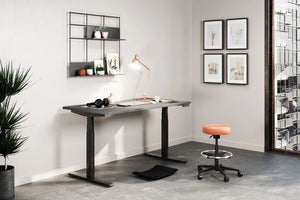 Gymba Ergonomic Foot Board with Grey Top Sitstand Desk and Orange Draughtsman Seating in Modern Office Setting