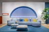 Hevea 5183 Space Partition with Pot Holders in White with Blue Modular Sofa and Grey Square Tables  in Lounge Setup