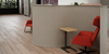Koala Acoustic Curved Screen Divider in Light Grey Finish with Red Armchair and Oak Top Coffee Table