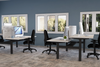Koala Acoustic PET Pattern Screens in Light Grey Finish with White Top Sit Stand Desk and Black Task Chair in Modern Office Setting