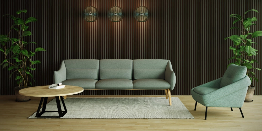 Koala Acoustic Wood Slats in Walnut Finish with Green Sofa and Armchair and Round Coffee Table in Lounge Setting