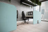 Koala Bench Freestanding Screen in Turquoise Finish with Black Officr Chair in Modern Office Setting