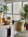 Kori Armchair with Biurgundy Round and Oval Shaped Side Table in Lounge Setting