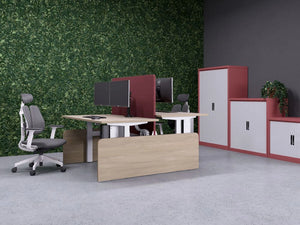 Leap Acoustic Bench Desk Screen in Burgundy Finish with Oak Top Sit Stand Desk and Grey Office Chair in Modern Office Setting