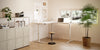 Leap L Shape Extension in White Finish with Movement Stool and Storage Cabinet in Home Office Setting