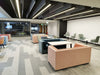 Lenny 2 Seater Low Back Chair in Different Finishes with White Top Tables in Modern Lounge Setting 3