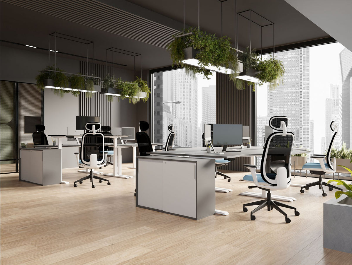 Levo Sit Stand Desks in Grey and White Finish with Contour Ergonomic Chair and Key Side Storage in Modern Office Setting 2