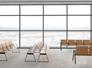 Lin Wood 4 Seater Bench In Airport Hallway Setting