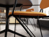 Line Canteen Chair Seat Detail in Upholstered Orange Finish with Black Steel Frame