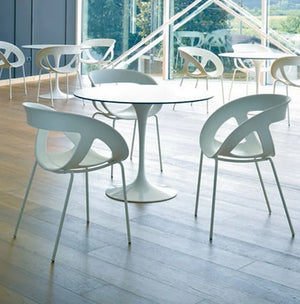 Moema Stackable Canteen Chair In Indoor Cafe Area