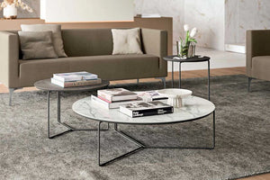 Montreal Side Round Table With Brown Sofa In Living Room Area