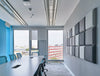 MuteDesign Blocks Square 3D Acoustic Wall Panels Grey in Meeting Room with Chairs and Boardroom Table