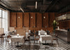 Nimm Wooden Meeting Room Chair with Table and Freestanding Screen in Restaurant Setting