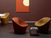 Pedrali Log Upholstered Lounge Armchair 14 In Orange And Gold At A Cafe