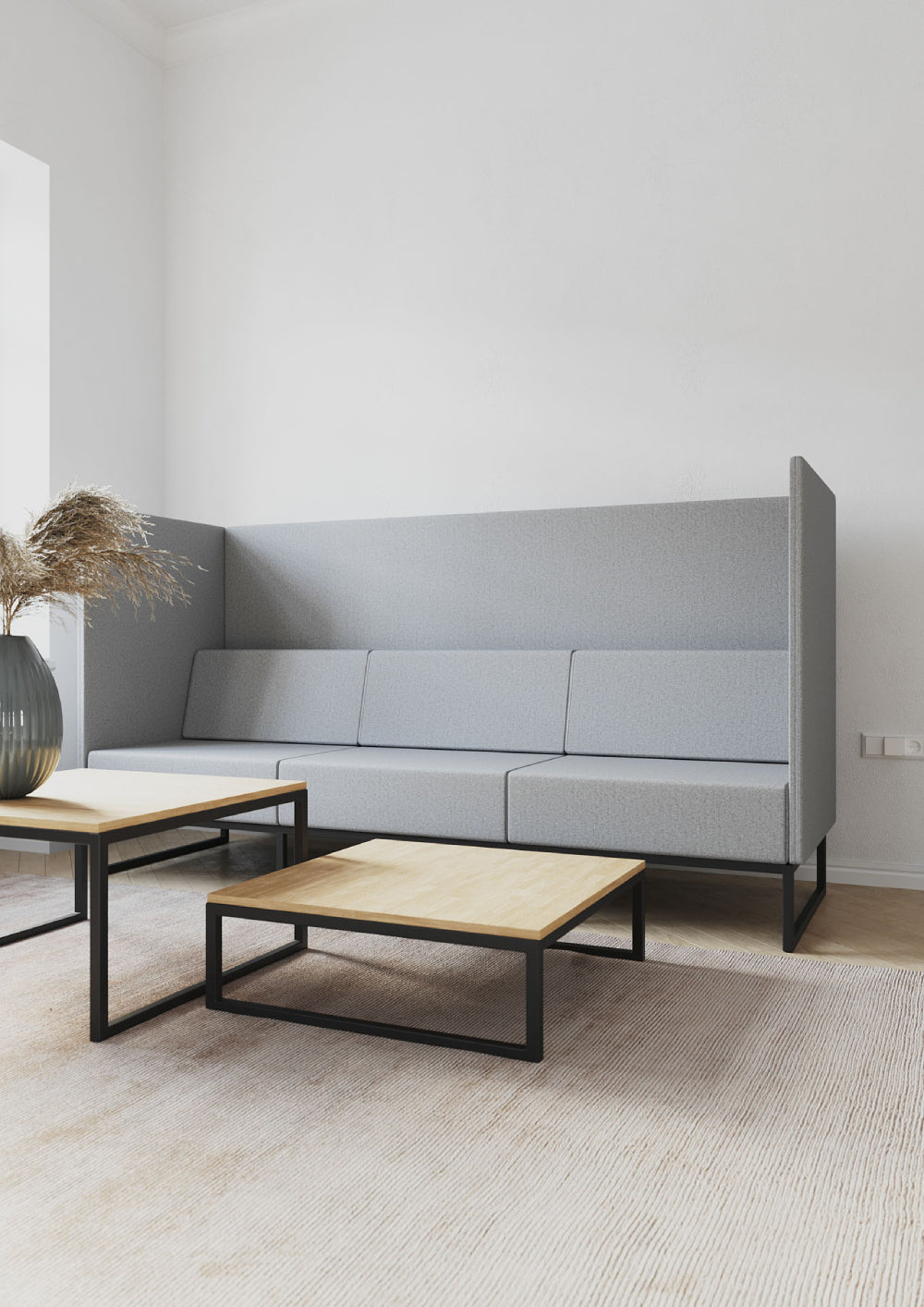 Plint Upholstered Modular Sofa with Coffee Table in Living Room Setting