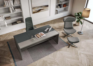 Quadrifoglio E 9 Executive Desk In 2 Toned Finish With Black Boardroom Chair And White Bookshelves In Office Setting