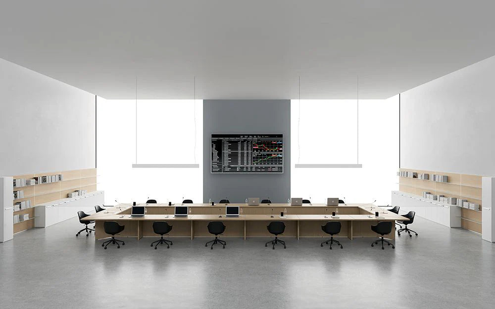 Rectangular Boardroom Table in Light Oak Finish with Task Chairs and Bookshelves in Modern Office Setting