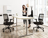 RoundE Bamboo Sit Stand Desk in White with Black Mesh Back Armchair in Modern Office Setting