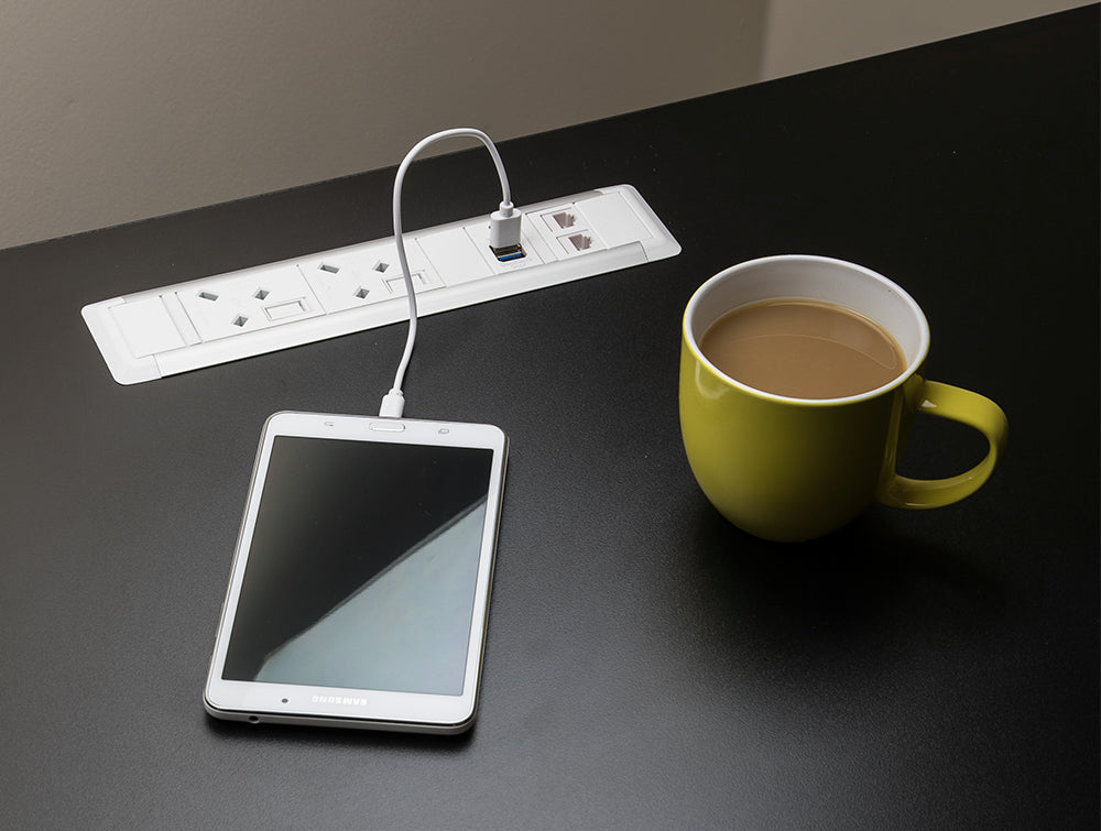 Slimline Omega 2 UK Sockets In Desk Power Module White Attached in the Table