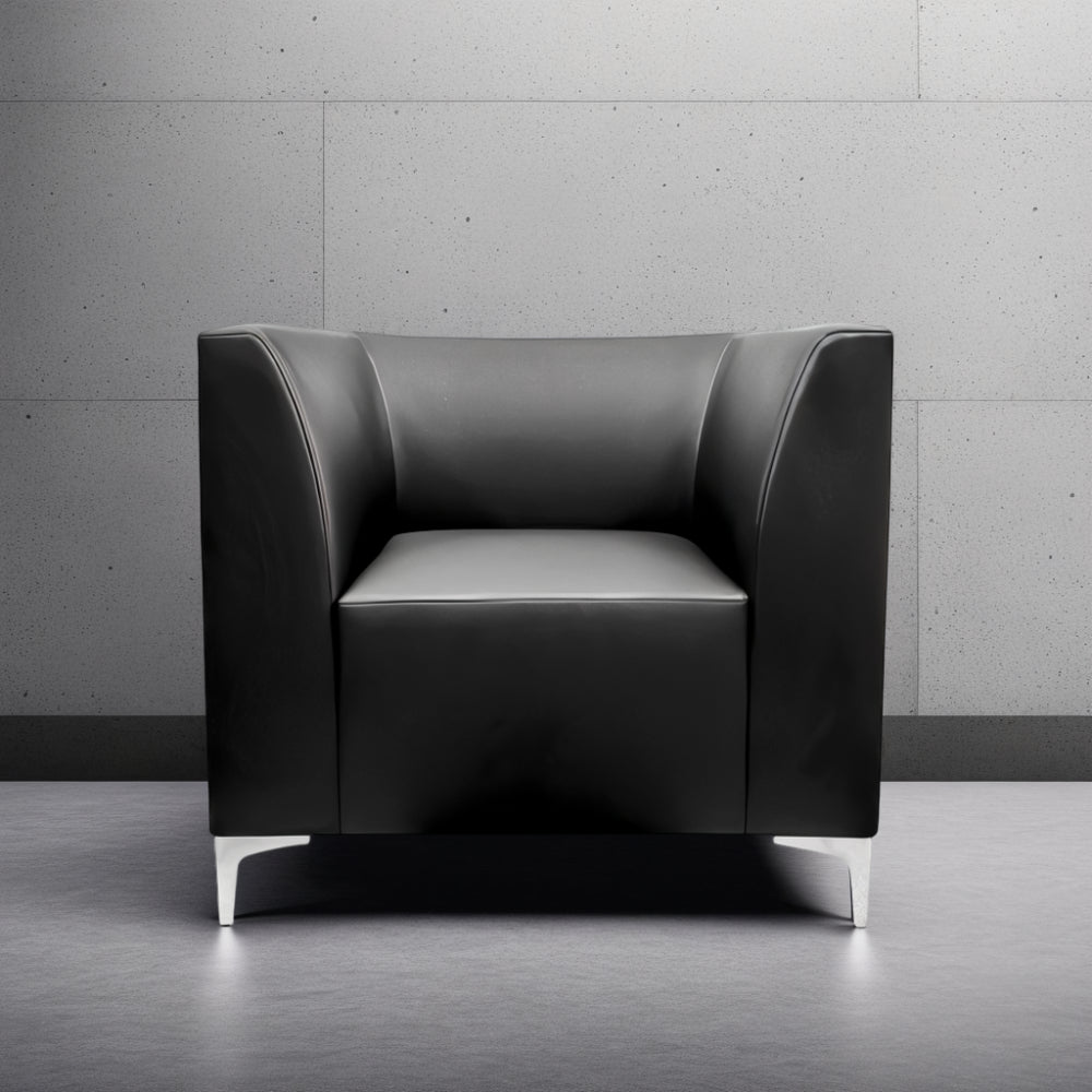 Stand Alone Armchair in Black Faux Leather in Modern Office Setting