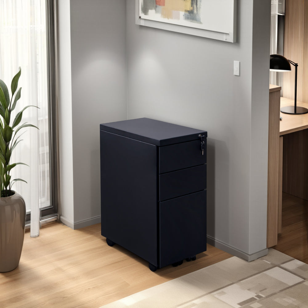 Steel Slimline 3 Drawer Pedestal with Indoor Plant and Table Lamp in Modern Office Setting