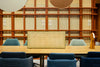 Sund L Wooden Meeting Room Table with Desk Screen and Chairs in Modern Office Setting