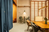 Sund M Wooden Meeting Room Table with Highstool and Desk Screen in Modern Office Setting